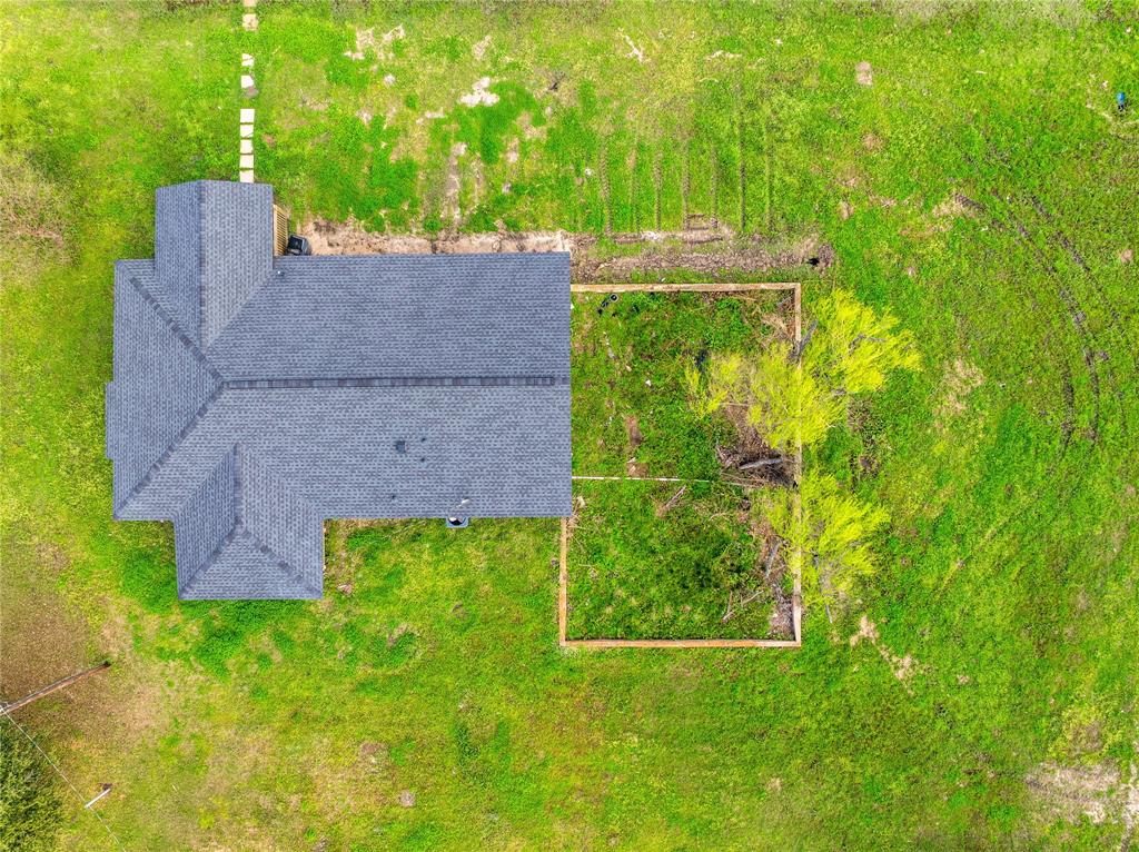 500 County Road 3724 Wills Point, TX 75169 - Photo 28 of 32 a backyard of a house with lots of green space