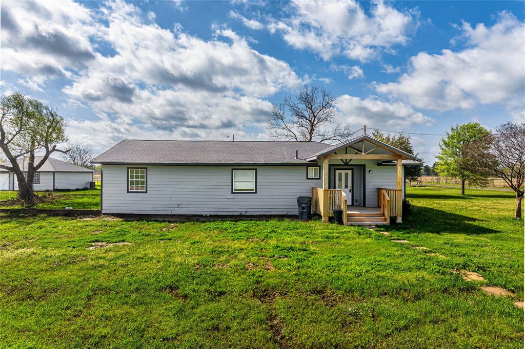 500 County Road 3724 Wills Point, TX 75169 - Photo 30 of 32 a front view of a house with garden