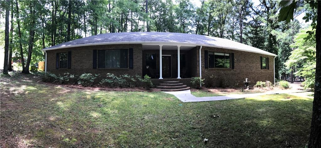 This home was built to last. 4 sided brick in excellent condition. Double pane windows. Hardwood Floors in living room, dining room, bedrooms and hall.  Yard is low maintenance so you can spend most of your time on the lake... 