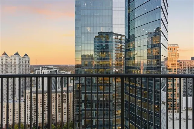 a view of a balcony with city view