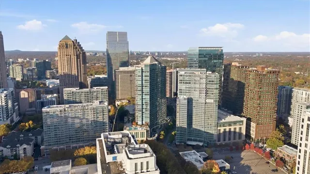 a view of city with tall buildings