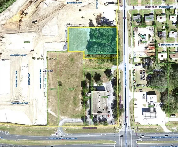 a view of swimming pool with a yard