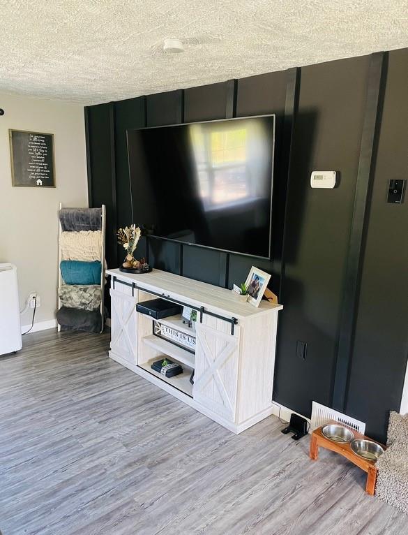 839 Methodist Road Greenville, PA 16125 - Photo 6 of 21 a room with furniture and a flat screen tv