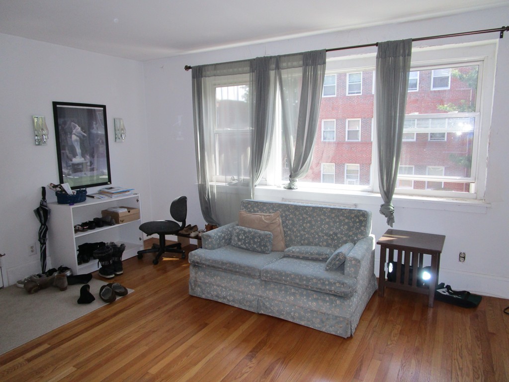 6 O'Leary Way, Unit 82 Boston, MA 02130 - Photo 2 of 14 a living room with furniture and a window