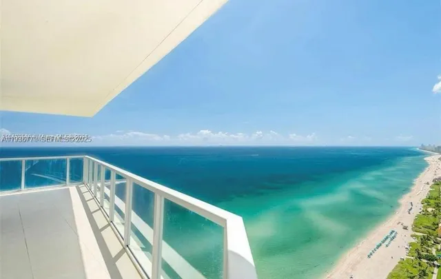 a view of balcony with yard