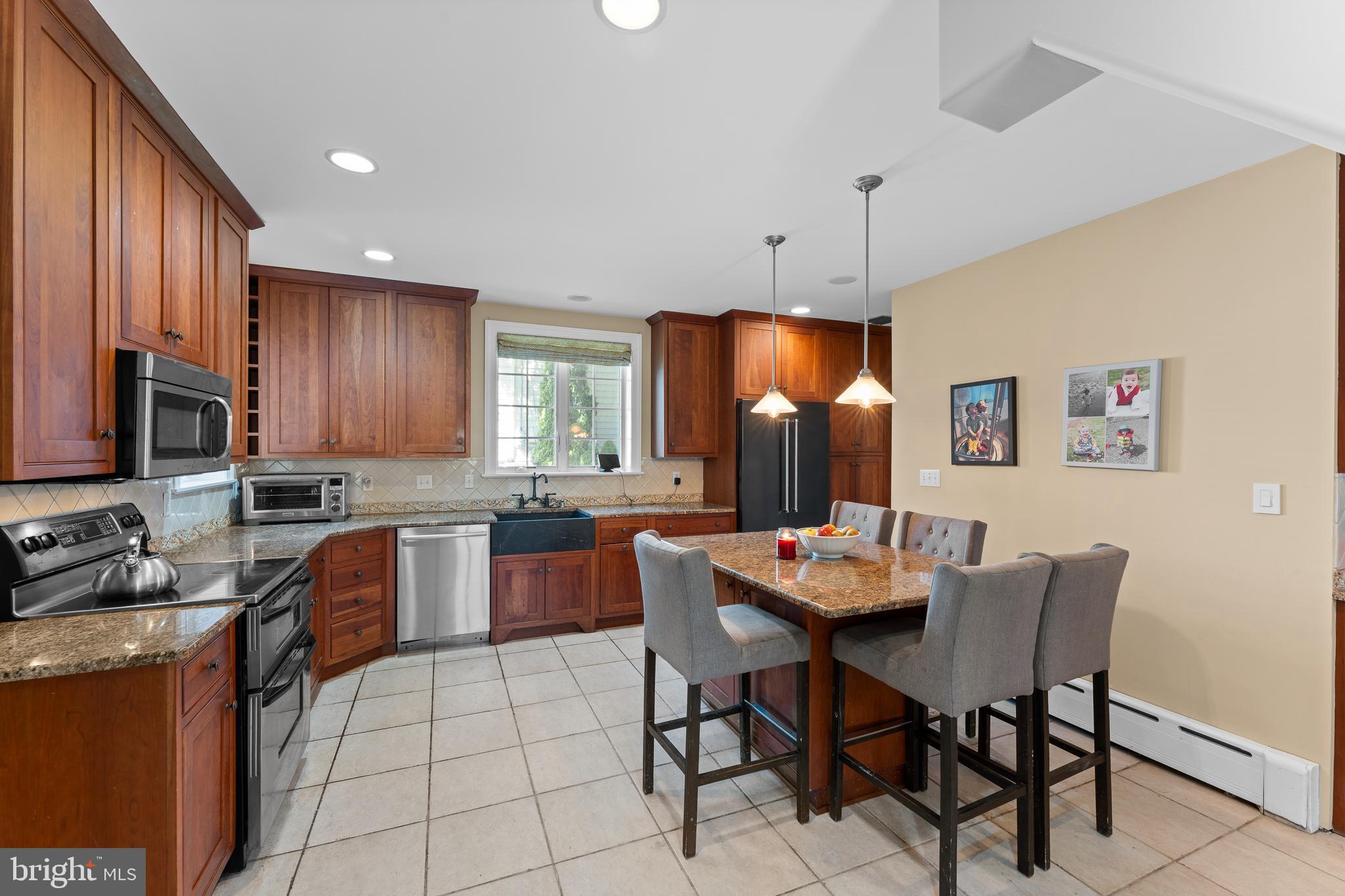 233 Shawnee Road Ardmore, PA 19003 - Photo 11 of 32 Enjoy the eat-in kitchen and stainless appliances.