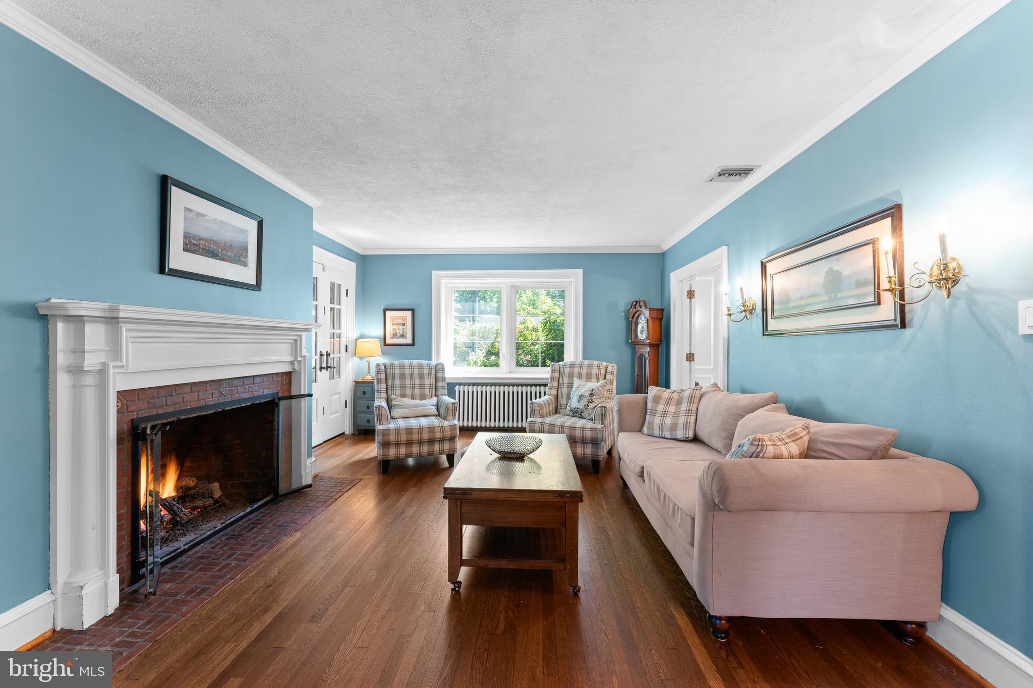 233 Shawnee Road Ardmore, PA 19003 - Photo 6 of 32 Access to sunroom past fireplace.