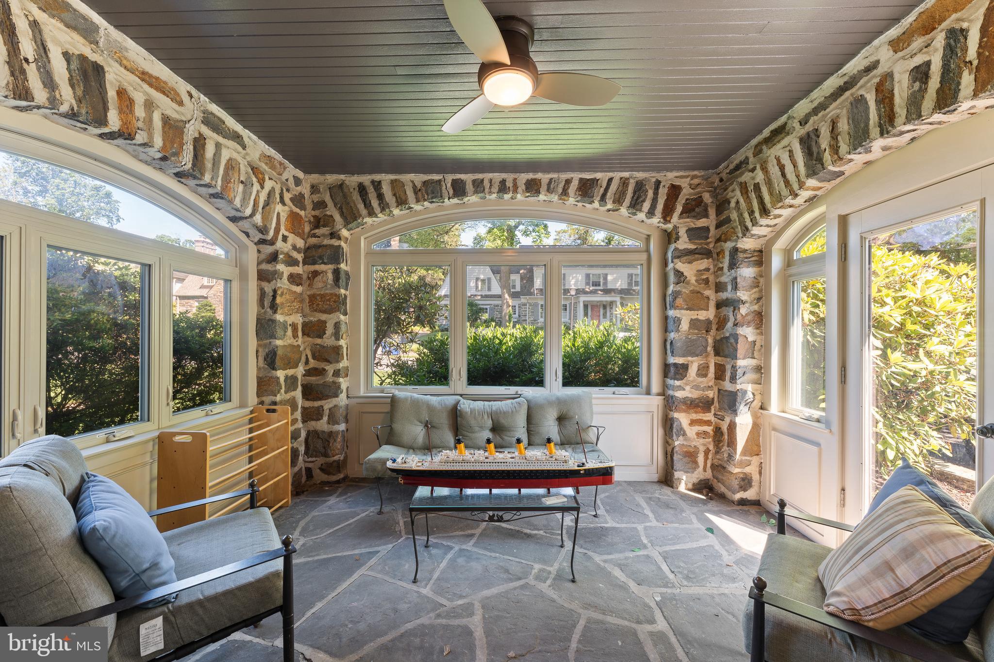 233 Shawnee Road Ardmore, PA 19003 - Photo 7 of 32 Enjoy the neighborhood from your 3 season sunroom!