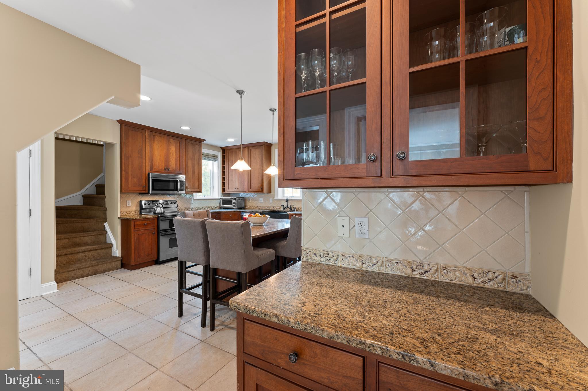 233 Shawnee Road Ardmore, PA 19003 - Photo 10 of 32 From dining room, access your bar or buffet.