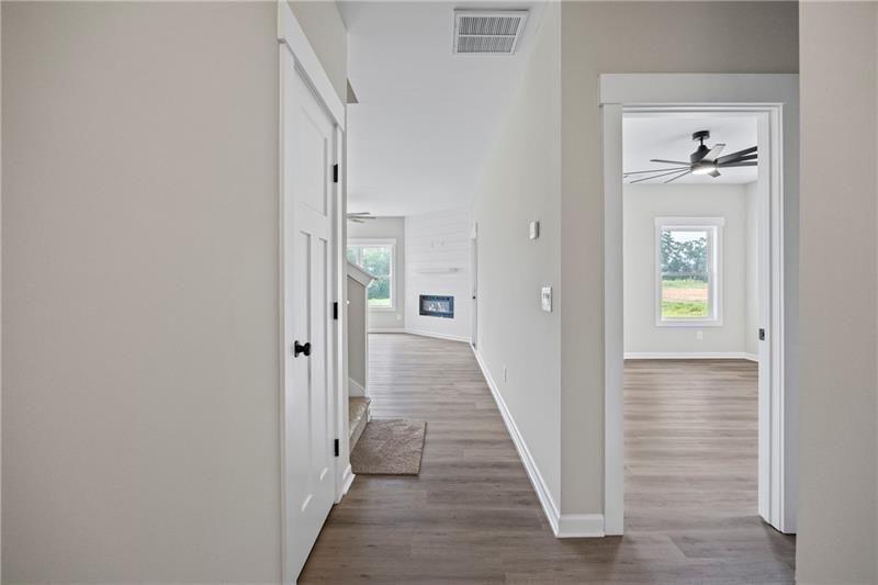 693 Racetrack Road Toccoa, GA 30577 - Photo 5 of 45 a view of a hallway with wooden floor and closet