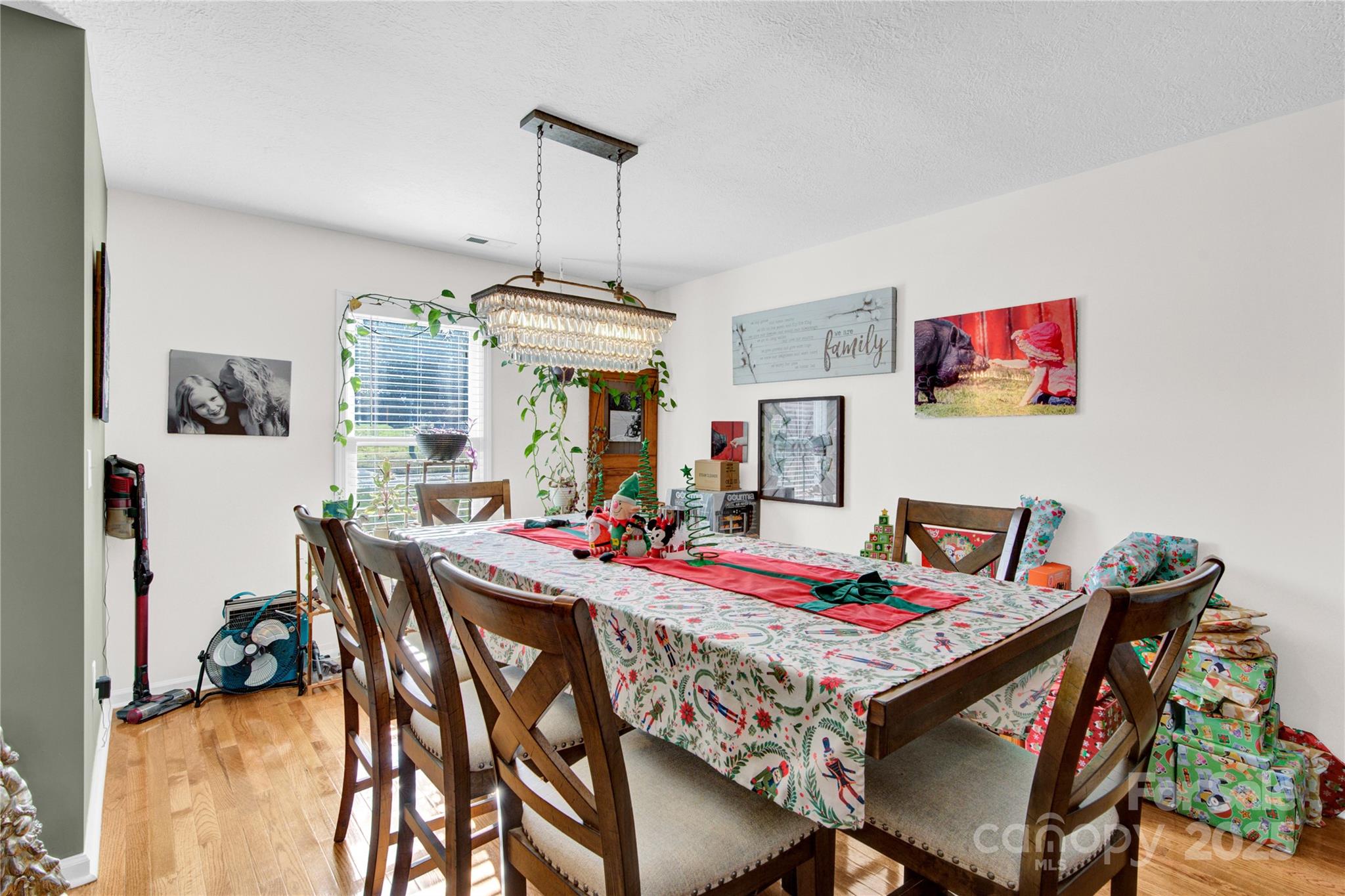 1659 Buffett Circle Hickory, NC 28602 - Photo 18 of 46 a view of a dining room with furniture and chandelier