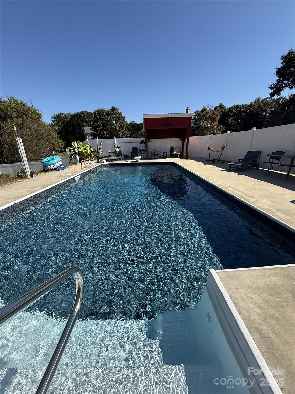 1659 Buffett Circle Hickory, NC 28602 - Photo 45 of 46 a view of a swimming pool with a yard and mountain view
