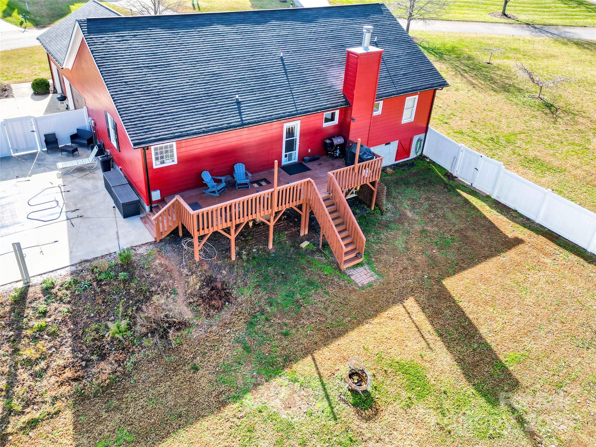 1659 Buffett Circle Hickory, NC 28602 - Photo 8 of 46 an outdoor sitting area with red umbrella