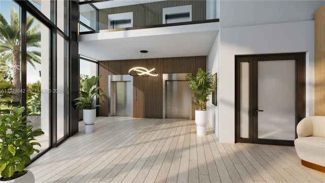 a view of interior space with wooden floor and stairs