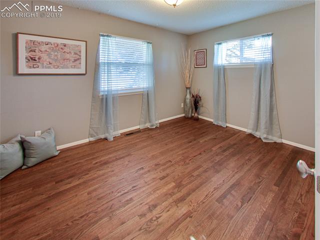 1904 North Chelton Road Colorado Springs, CO 80909 - Photo 16 of 31 Bedroom on Main Floor