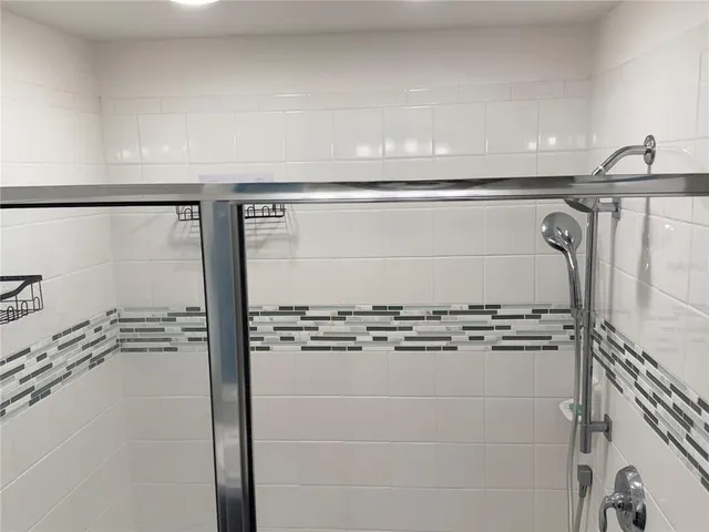 a view of a storage & utility room with washer and dryer