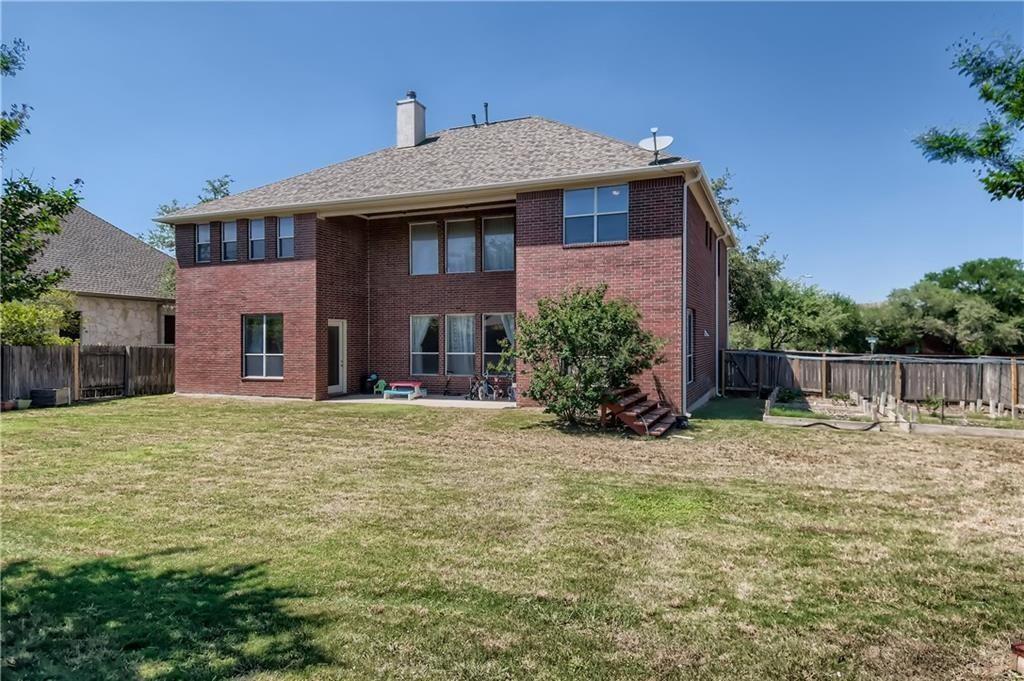3822 Remington Road Cedar Park, TX 78613 - Photo 26 of 31 a front view of a house with a garden