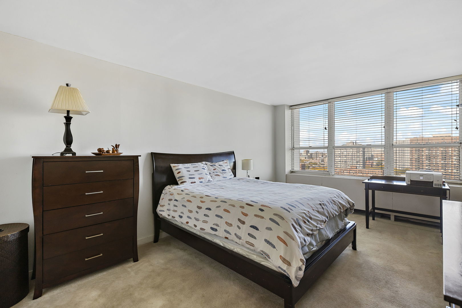 655 West Irving Park Road, Unit 1806 Chicago, IL 60613 - Photo 11 of 35 a bedroom with a bed and a window