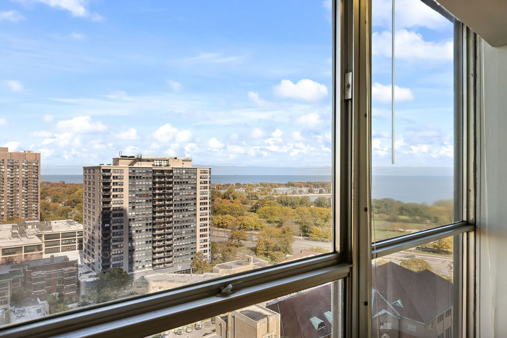655 West Irving Park Road, Unit 1806 Chicago, IL 60613 - Photo 14 of 35 a view of sky from a window