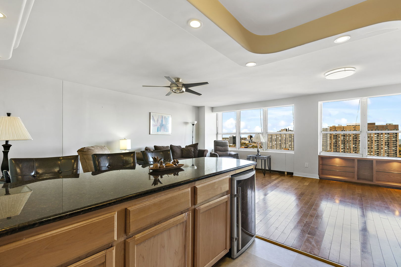 655 West Irving Park Road, Unit 1806 Chicago, IL 60613 - Photo 10 of 35 a kitchen with counter top space and living room
