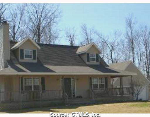 39 Partridge Road Warren, CT 06754 - Photo 1 of 1 a front view of a house with a yard