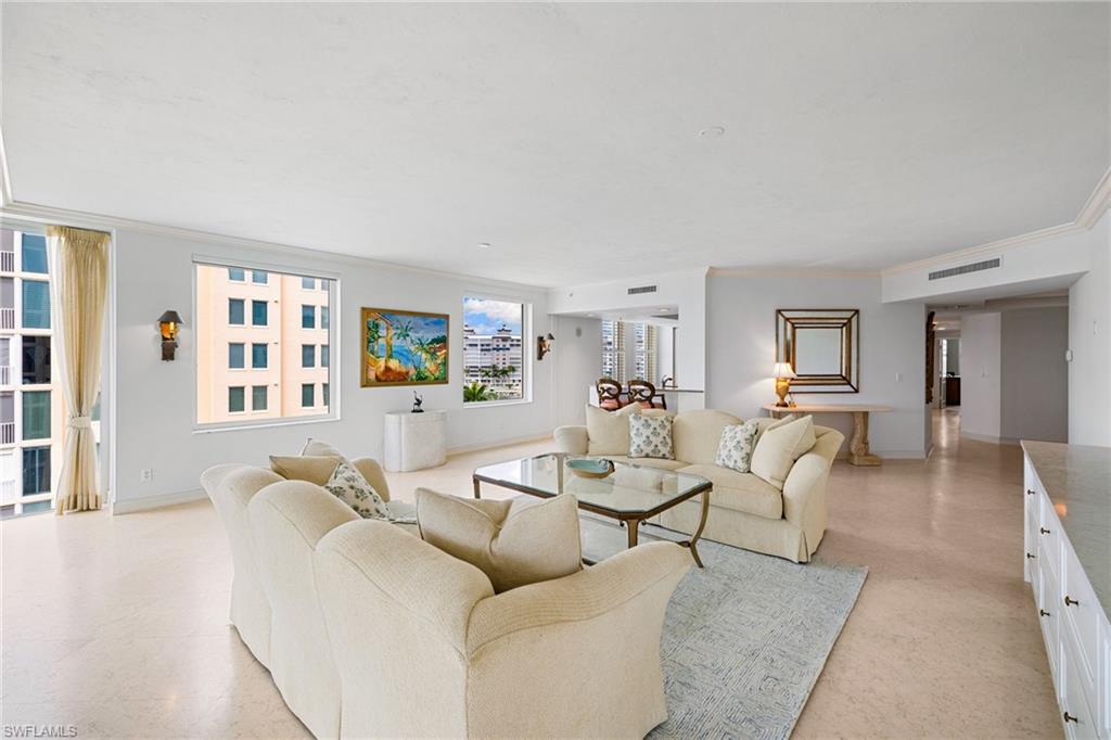 435 Dockside Drive, Unit A804 Naples, FL 34110 - Photo 11 of 50 Living room with crown molding