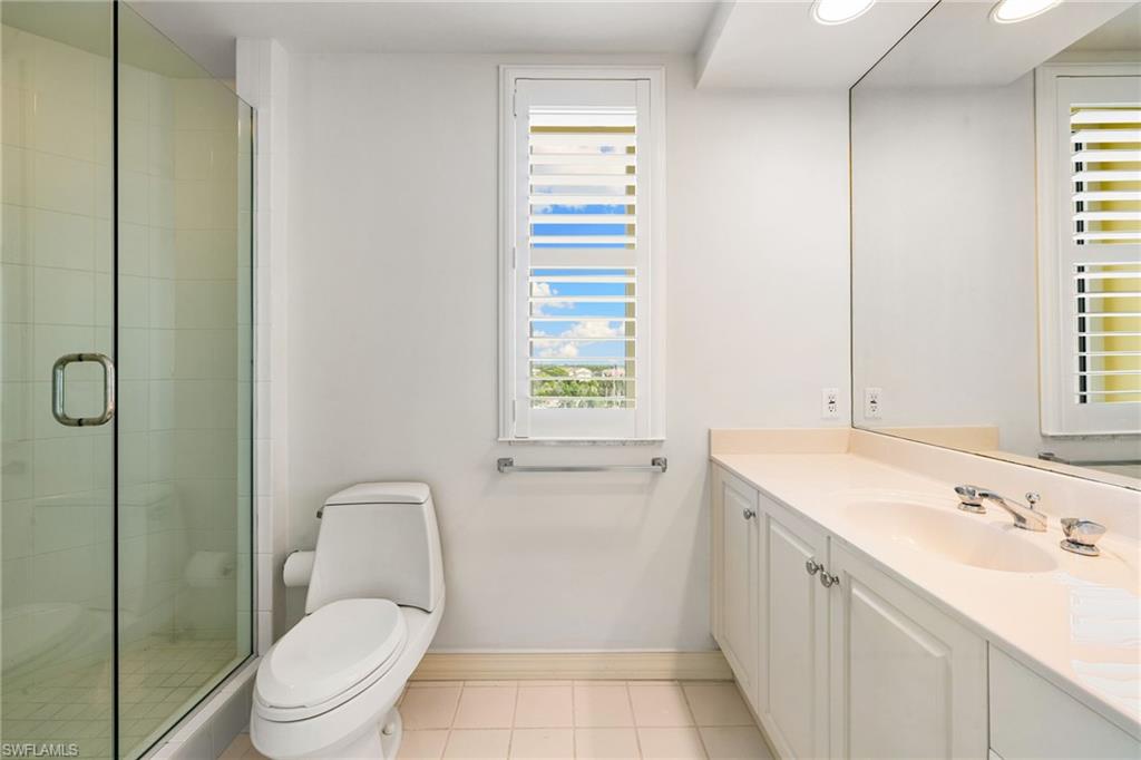 435 Dockside Drive, Unit A804 Naples, FL 34110 - Photo 33 of 50 Full bath featuring vanity, light tile patterned flooring, a stall shower, and recessed lighting