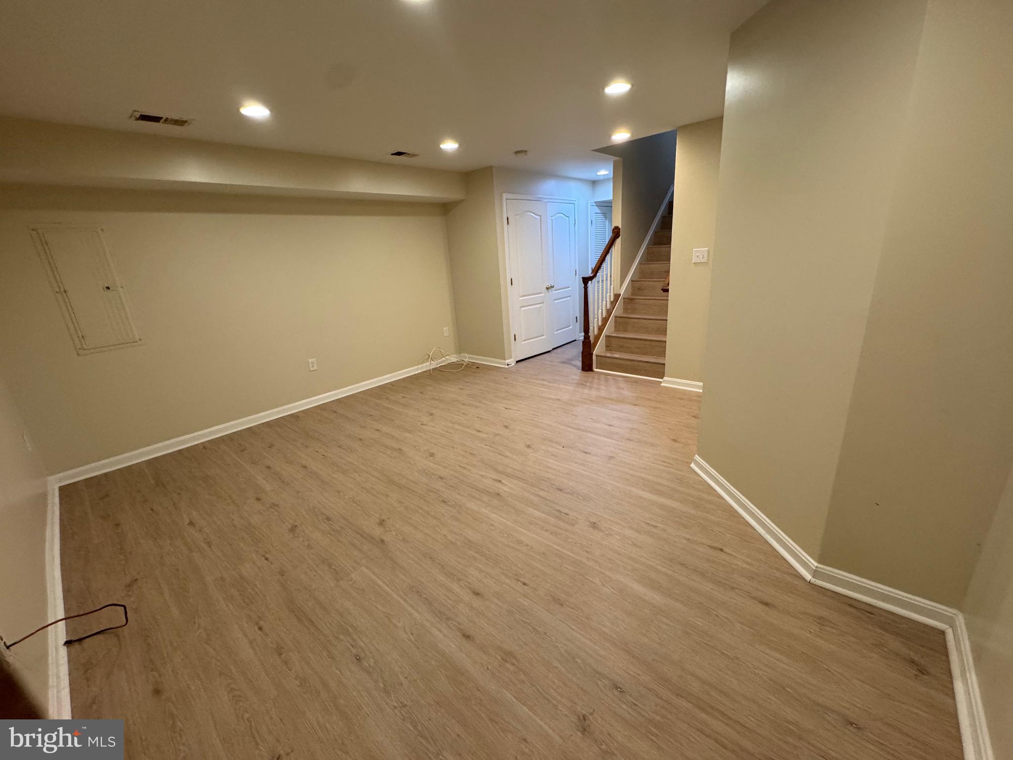 1905 Scaffold Way Odenton, MD 21113 - Photo 19 of 30 an empty room with wooden floor and entryway
