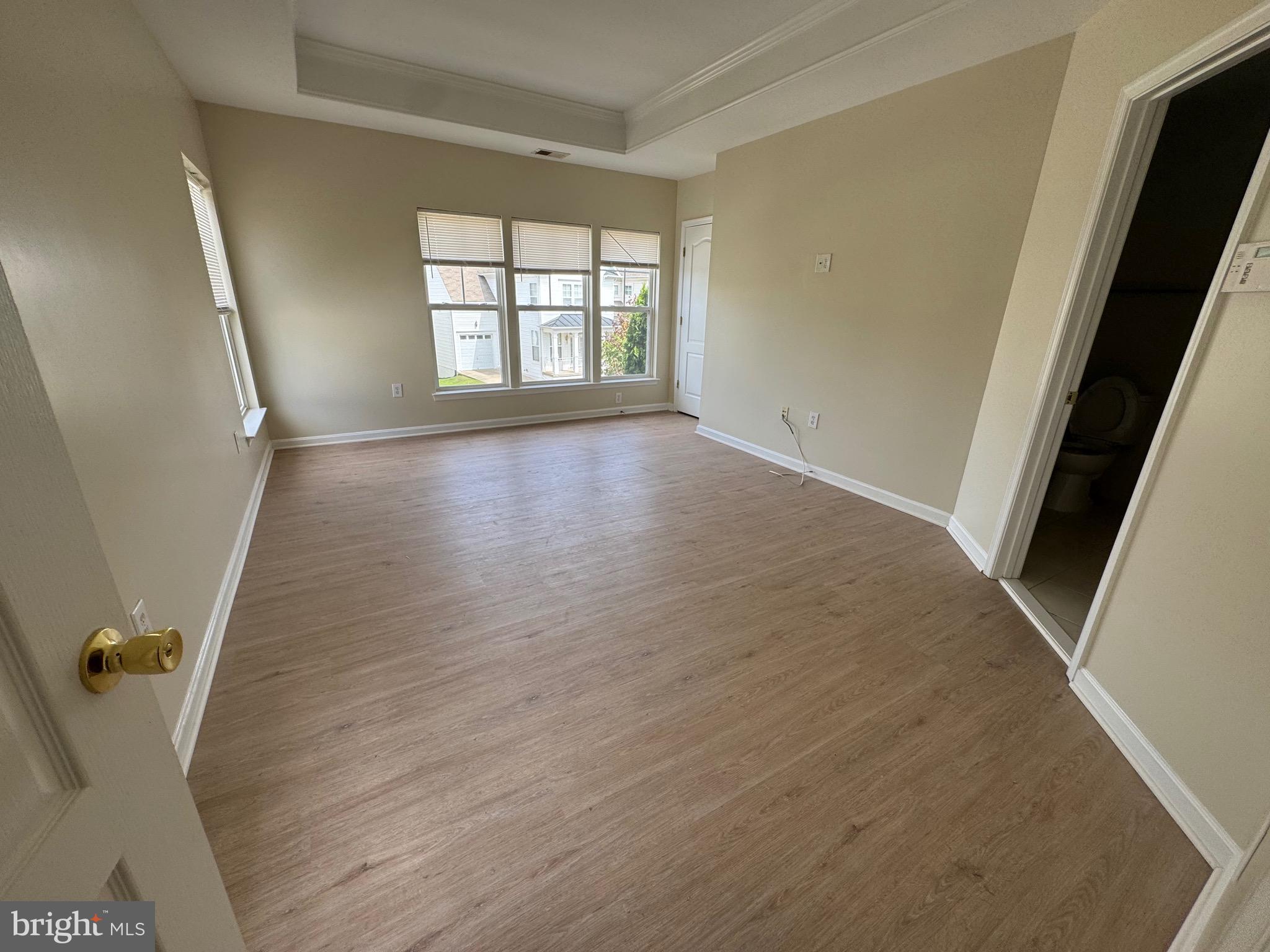 1905 Scaffold Way Odenton, MD 21113 - Photo 21 of 30 wooden floor in an empty room with windows