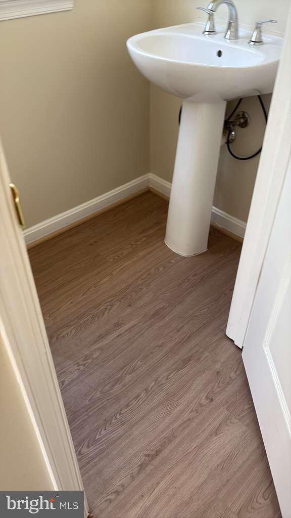 1905 Scaffold Way Odenton, MD 21113 - Photo 26 of 30 a bathroom with a sink and mirror