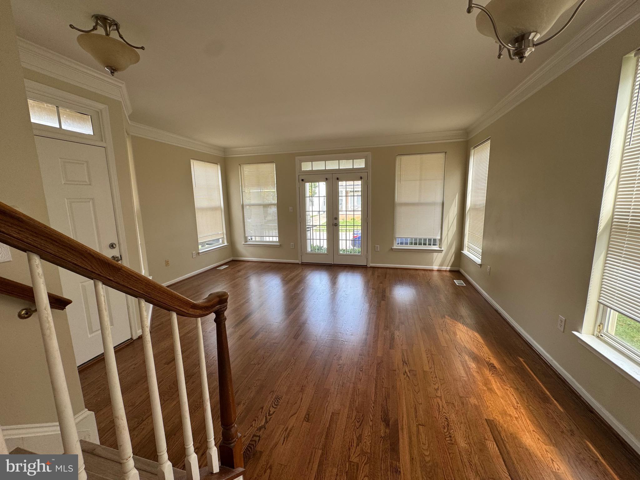 1905 Scaffold Way Odenton, MD 21113 - Photo 6 of 30 a view of an entryway with wooden floor and windows