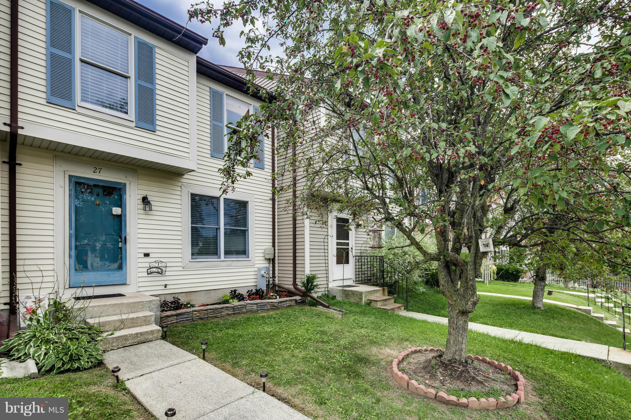 27 Robin Ridge Court Baltimore, MD 21234 - Photo 1 of 18 a front view of a house with garden