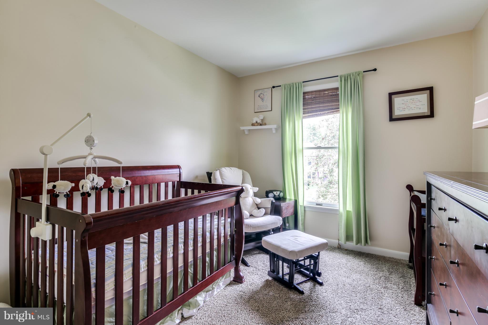 27 Robin Ridge Court Baltimore, MD 21234 - Photo 15 of 18 a bedroom with furniture and a window