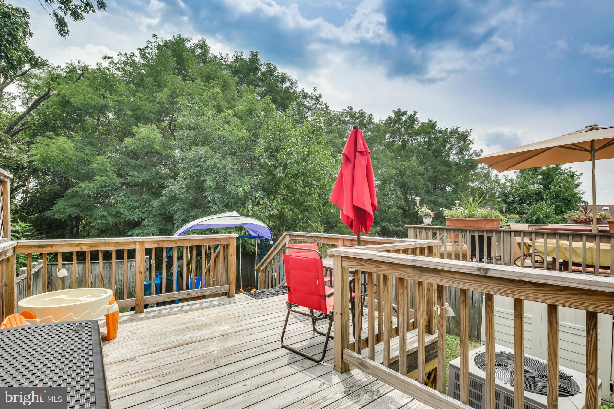 27 Robin Ridge Court Baltimore, MD 21234 - Photo 17 of 18 a view of balcony with deck and wooden floor