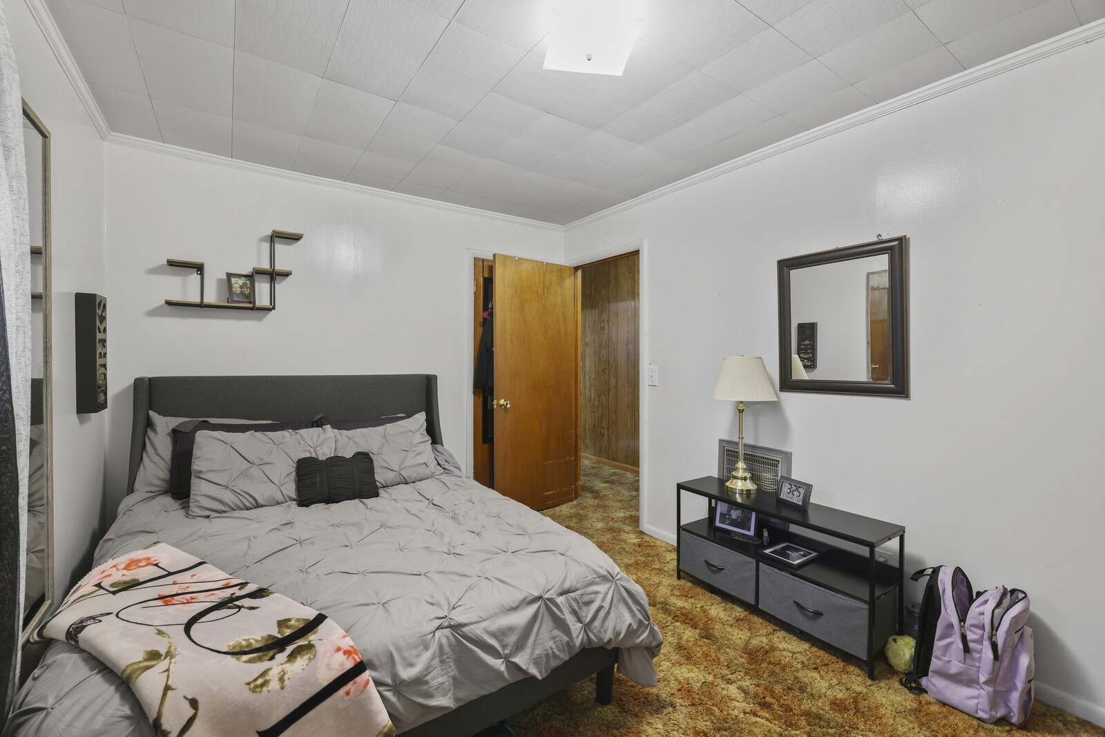 95 Pike Hill Road McMinnville, TN 37110 - Photo 11 of 42 a bedroom with a bed and wooden floor