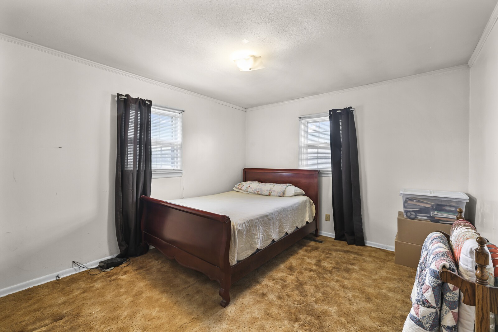 95 Pike Hill Road McMinnville, TN 37110 - Photo 15 of 42 a bedroom with a bed and a window