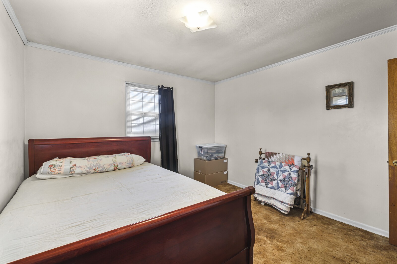 95 Pike Hill Road McMinnville, TN 37110 - Photo 17 of 42 a bedroom with a bed and a window