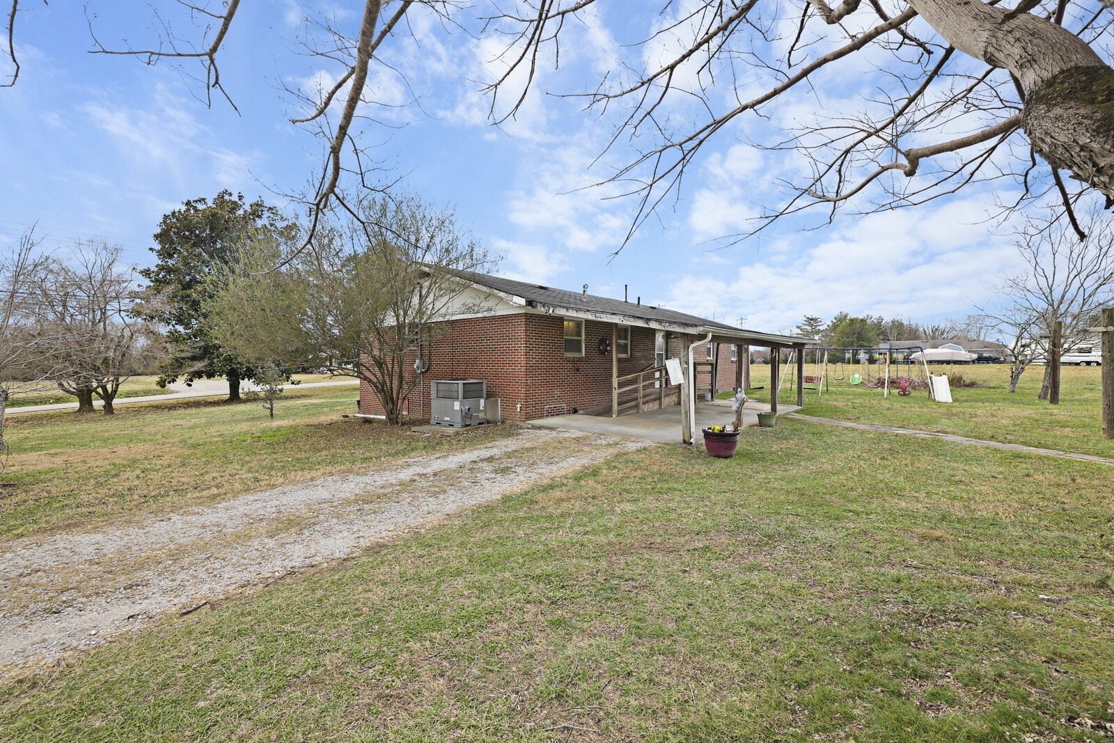 95 Pike Hill Road McMinnville, TN 37110 - Photo 18 of 42 a view of a house with a yard