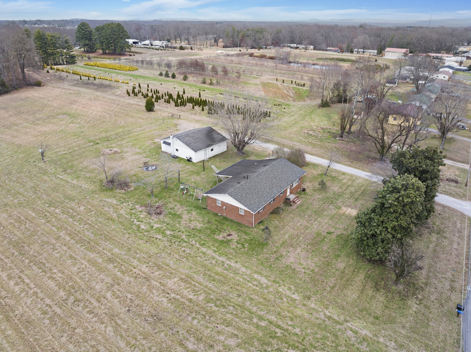 95 Pike Hill Road McMinnville, TN 37110 - Photo 34 of 42 an aerial view of residential houses with outdoor space