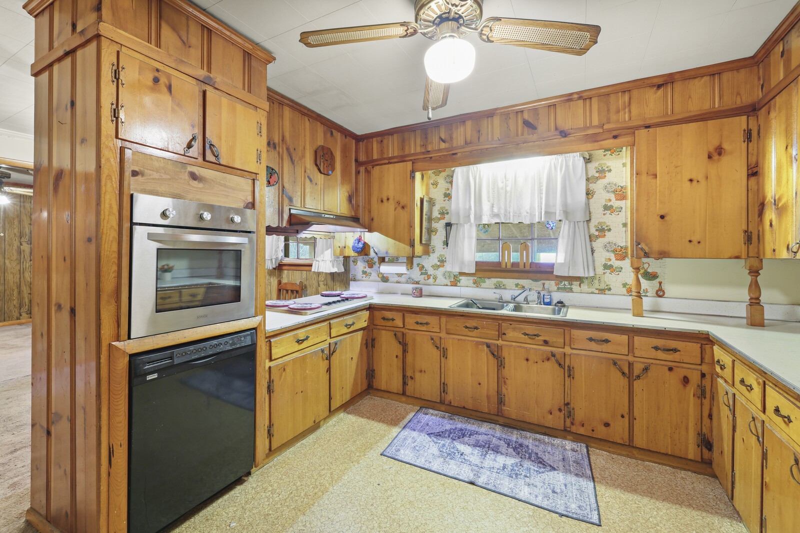 95 Pike Hill Road McMinnville, TN 37110 - Photo 7 of 42 a kitchen with stainless steel appliances a sink and cabinets