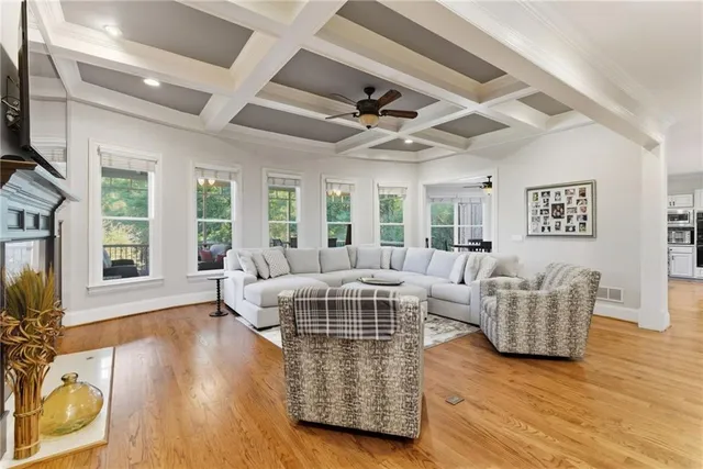 a spacious bathroom with a double vanity sink mirror and bathtub