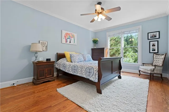 a bathroom with a toilet and a bathtub