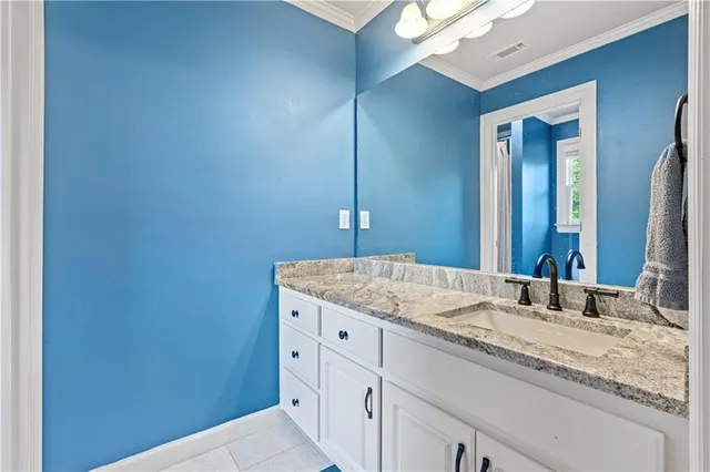 a view of a room with furniture and wooden floor