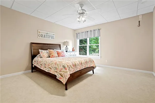 a view of a patio with a dining table and chairs