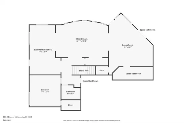 an aerial view of a house with swimming pool garden and patio