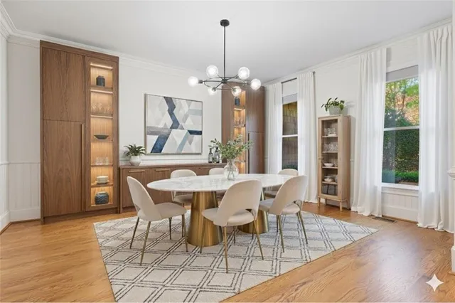 a view of an entryway with wooden floor