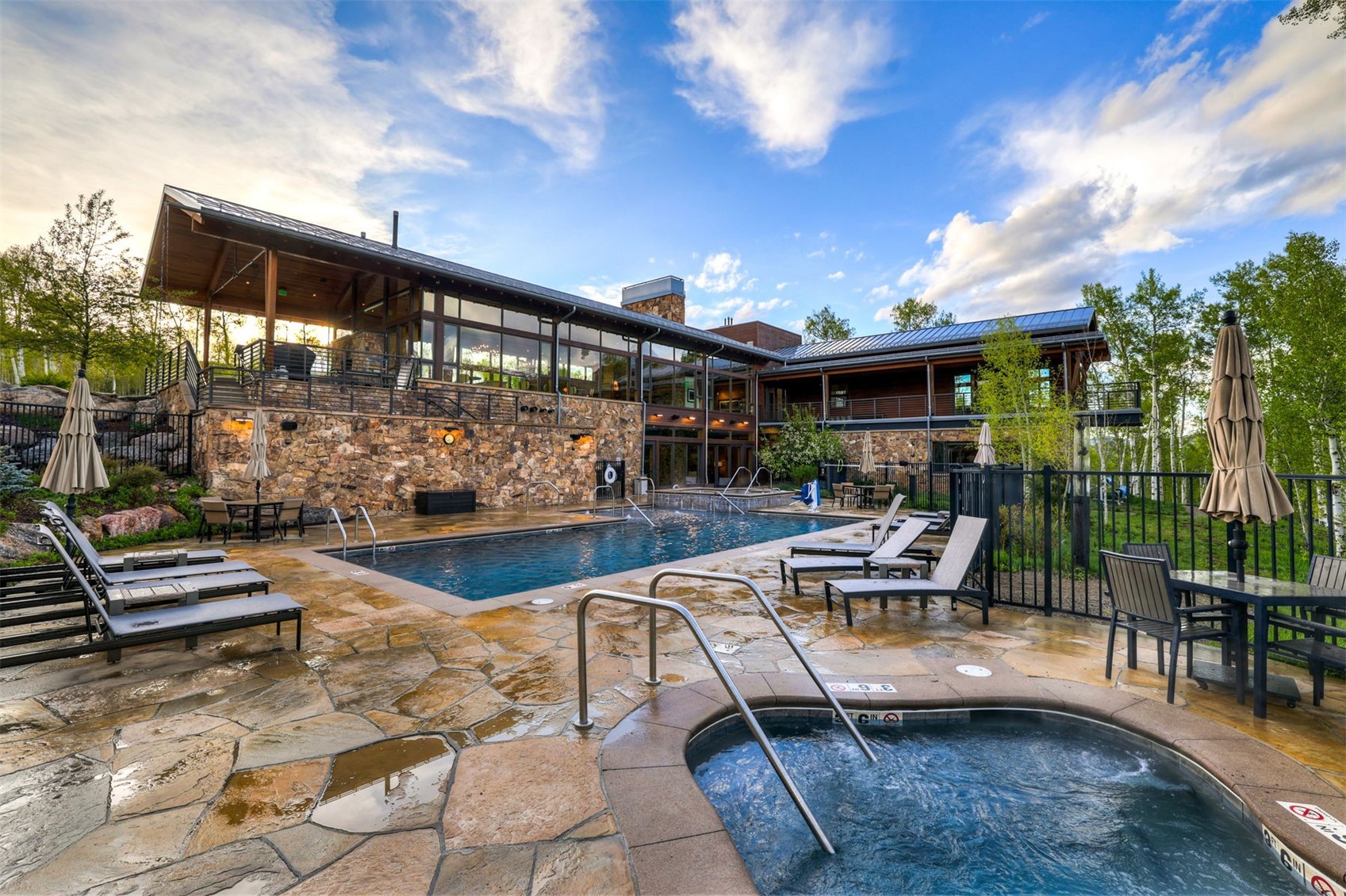 21 Moss Way Silverthorne, CO 80498 - Photo 41 of 50 a view of a patio with swimming pool and sitting area