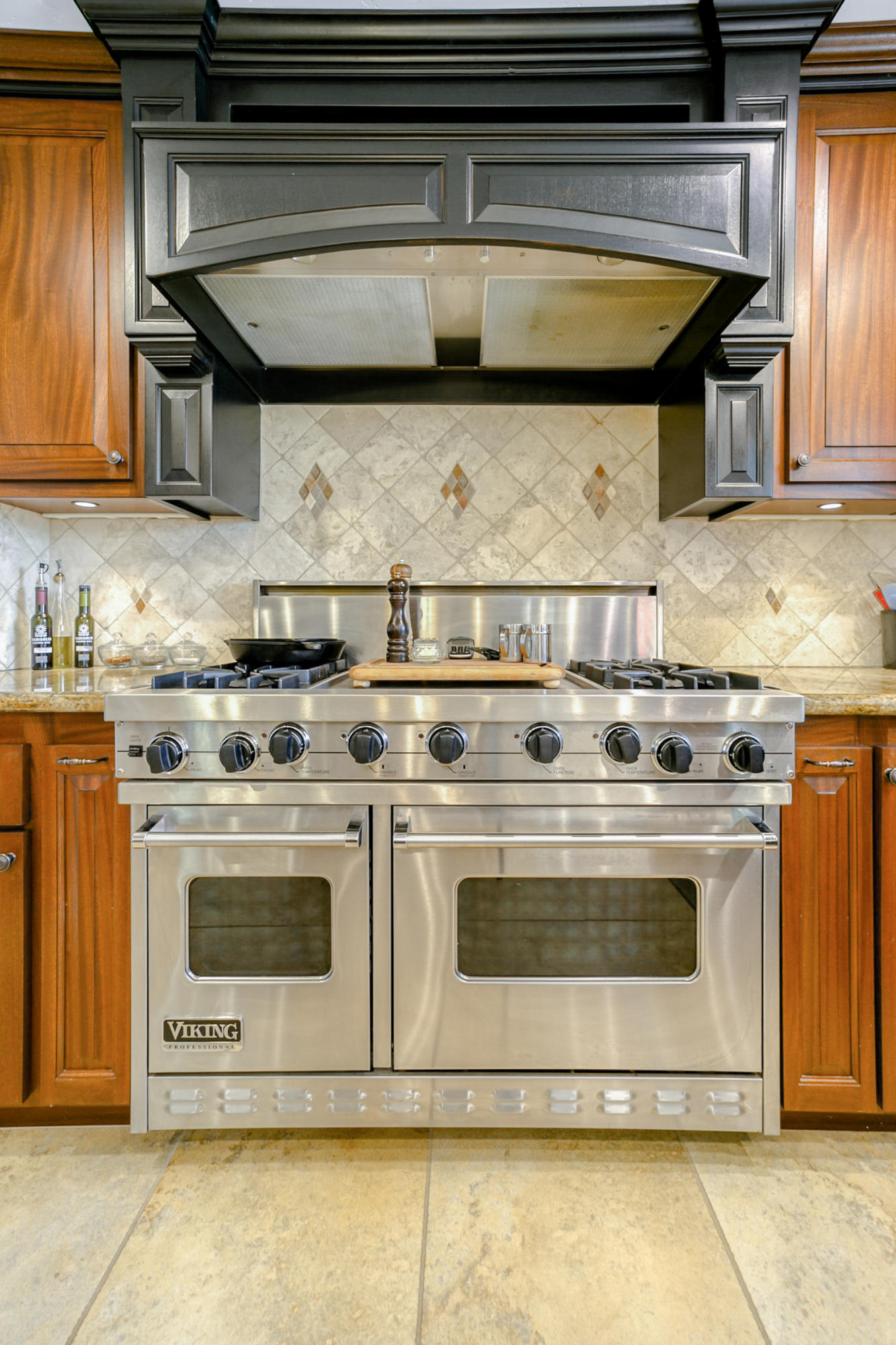 14385 Del Oro Court Red Bluff, CA 96080 - Photo 32 of 33 a stove top oven sitting inside of a kitchen