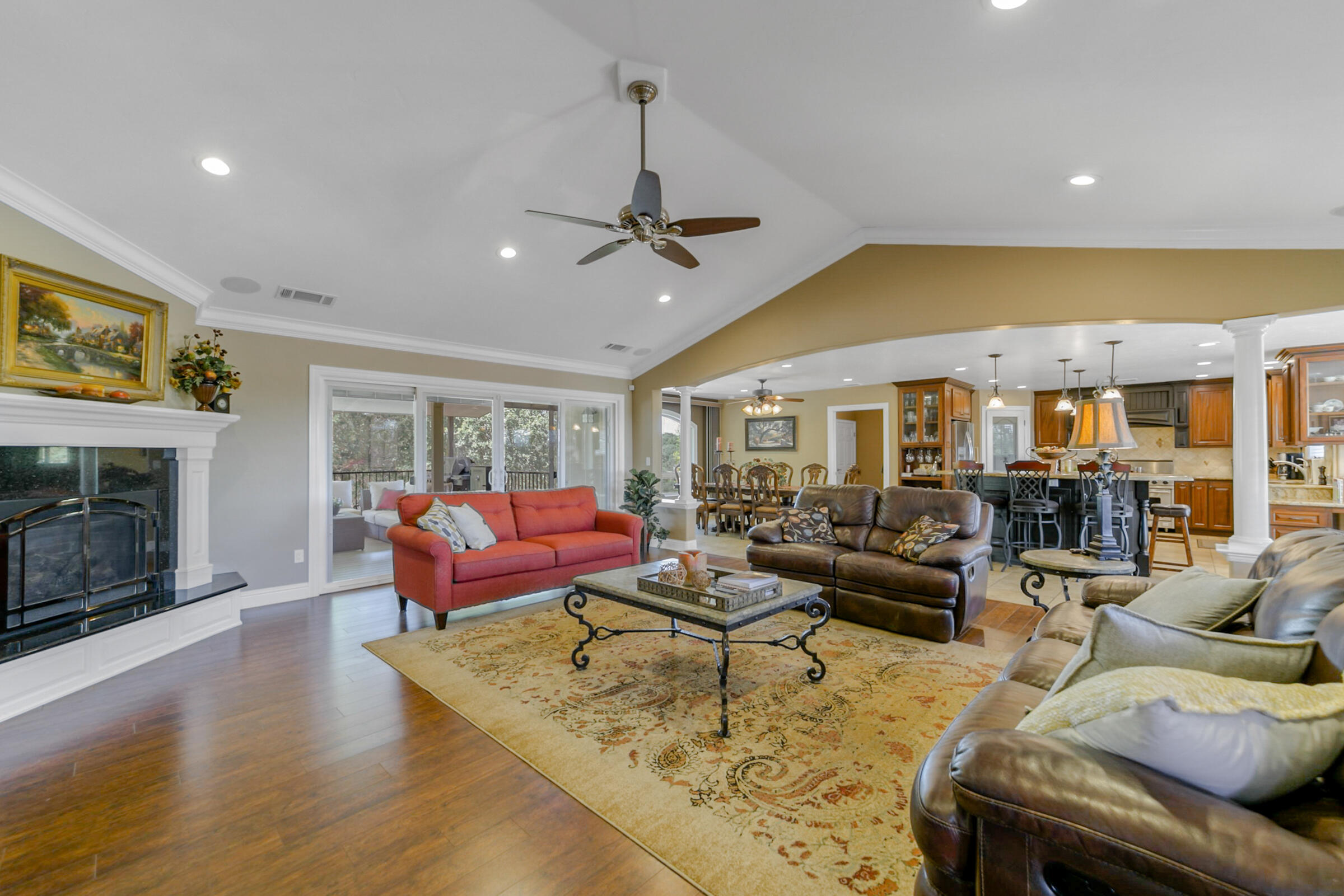 14385 Del Oro Court Red Bluff, CA 96080 - Photo 9 of 33 a living room with furniture and a fireplace