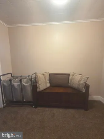 a view of a bathroom with tub sink